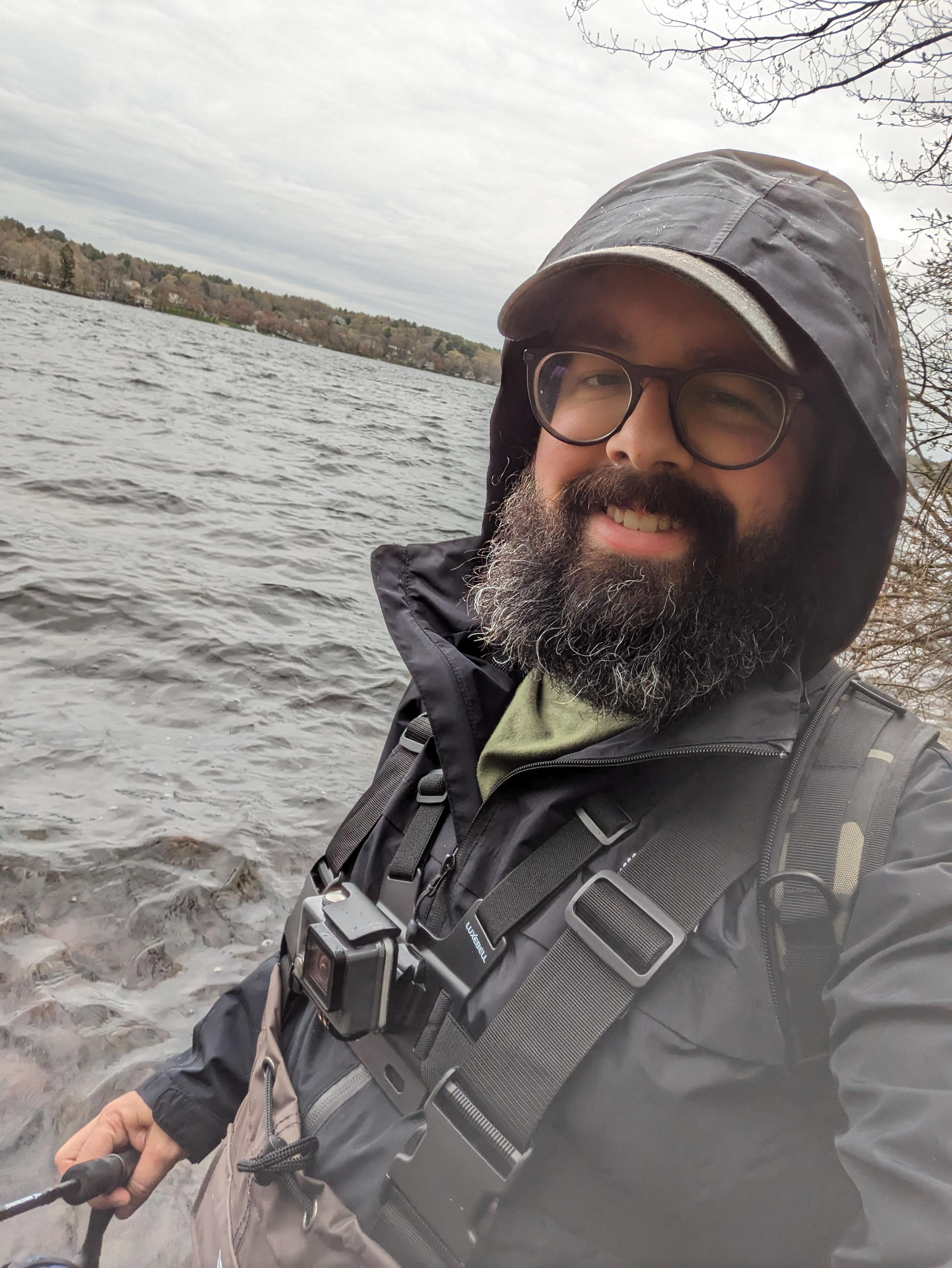 Selfie of myself, Andrew Augusto, fishing on a rainy day in fishing waders